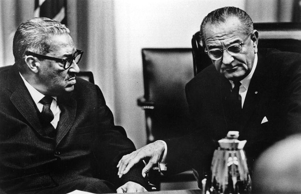 Judge Thurgood Marshall (left) in discussion with statesman Lyndon Baines Johnson, 36th President of the United States of America, following Marshall