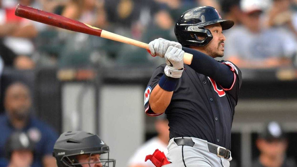 Jul 12, 2025; Chicago, Illinois, USA; Cleveland Guardians left fielder Steven Kwan (38) hits a sacrifice RBI during the seventh inning against the Chicago White Sox at Rate Field. Mandatory Credit: Patrick Gorski-Imagn Images