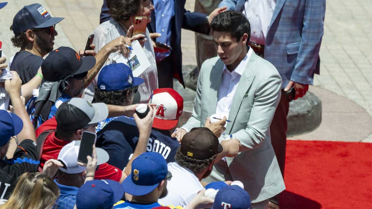 Jul 16, 2024; Arlington, Texas, USA; National League outfielder Christian Yelich of the Milwaukee Brewers (22) walks the red carpet before the 2024 MLB All-Star game at Globe Life Field. Mandatory Credit: Jerome Miron-USA TODAY Sports