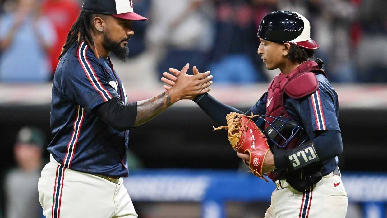 Jul 18, 2025; Cleveland, Ohio, USA; Cleveland Guardians pitcher Emmanuel Clase (48) celebrates with catcher Bo Naylor (23) after the Guardians beat the Athletics at Progressive Field.