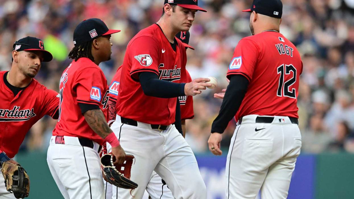 Jul 20, 2024; Cleveland, Ohio, USA; Cleveland Guardians manager Stephen Vogt (12) relieves starting pitcher Gavin Williams (32) during the fourth inning against the San Diego Padres at Progressive Field.
