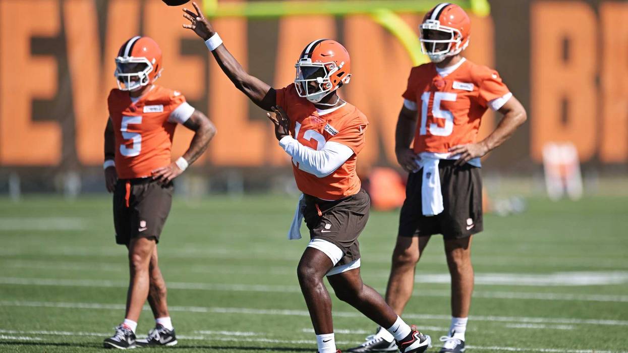 Jul 23, 2025; Berea, OH, USA; Cleveland Browns quarterback Dillon Gabriel (5) throws a pass as quarterback Joe Flacco (15) land quarterback Dillon Gabriel (5) look on during training camp at CrossCountry Mortgage Campus.