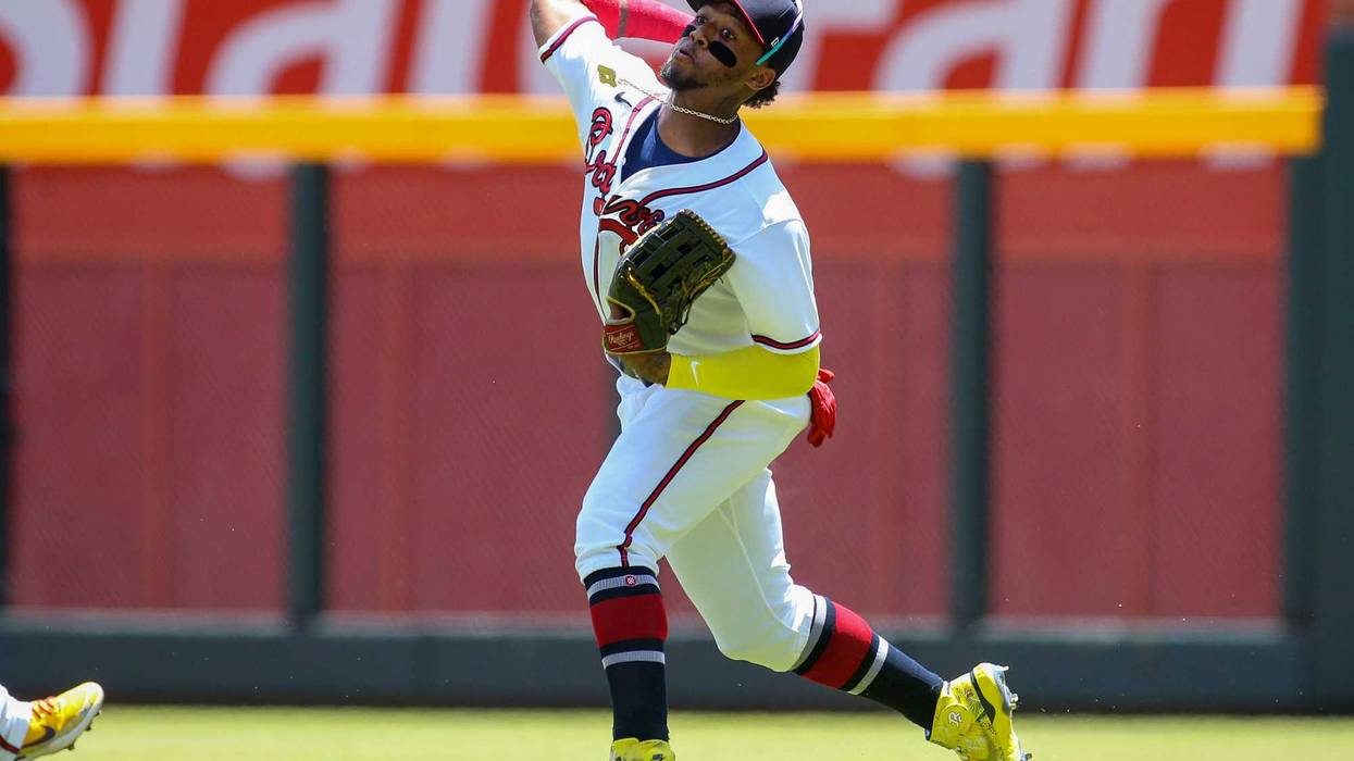 Jul 24, 2022; Atlanta, Georgia, USA; Atlanta Braves right fielder Ronald Acuna Jr. (13) throws the ball in against the Los Angeles Angels in the first inning at Truist Park.
