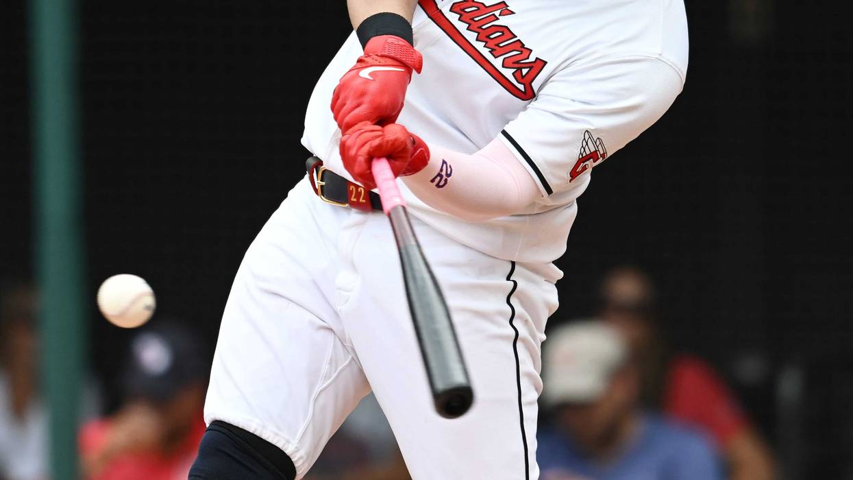 Jul 25, 2024; Cleveland, Ohio, USA; Cleveland Guardians first baseman Josh Naylor (22) hits a double during the seventh inning against the Detroit Tigers at Progressive Field.
