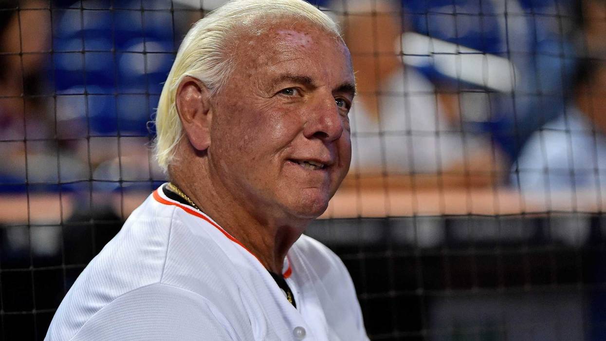Jul 28, 2017; Miami, FL, USA; Former wrestling WCW and WWE wrestler Ric Flair warms up before throwing out the first pitch at Marlins Park prior to the game between the Cincinnati Reds and the Miami Marlins.