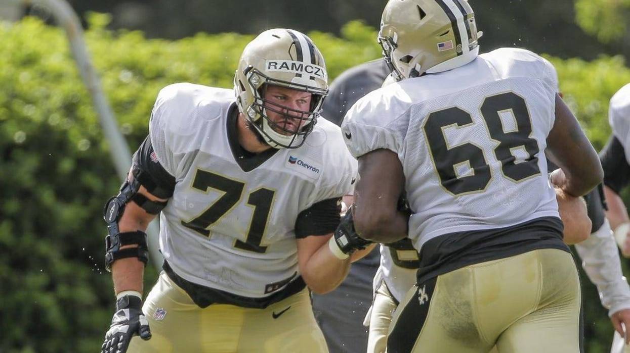 Jul 28, 2019; Metairie, LA, USA; New Orleans Saints offensive tackle Ryan Ramczyk (71) works against offensive tackle Derrick Kelly (68) during training camp at the Ochsner Sports Performance Center.