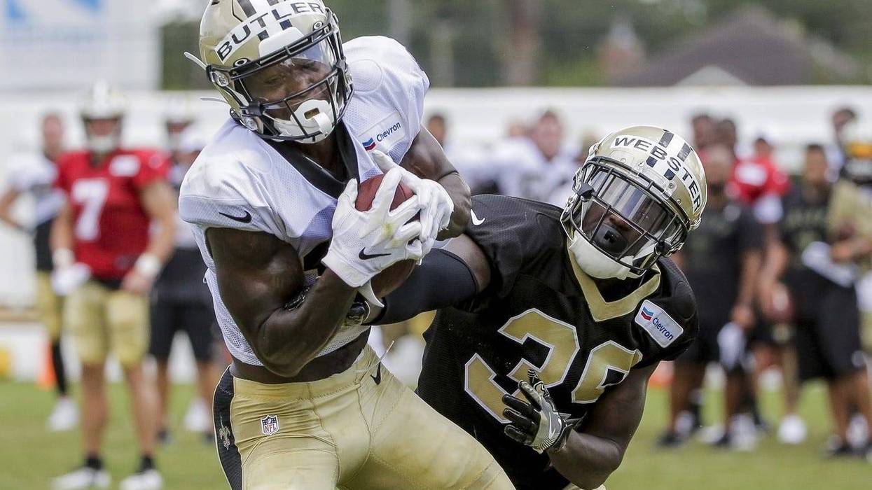 Jul 28, 2019; Metairie, LA, USA; New Orleans Saints wide receiver Emmanuel Butler (17) catches a pass over defensive back Kayvon Webster (39) during training camp at the Ochsner Sports Performance Center.