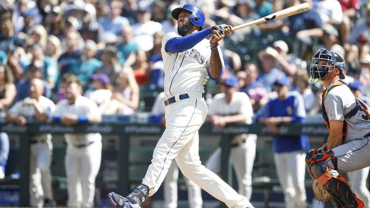 Jul 28, 2019; Seattle, WA, USA; Seattle Mariners right fielder Domingo Santana (16) hits a solo-home run against the Detroit Tigers during the eighth inning at T-Mobile Park. Mandatory Credit: Joe Nicholson-USA TODAY Sports