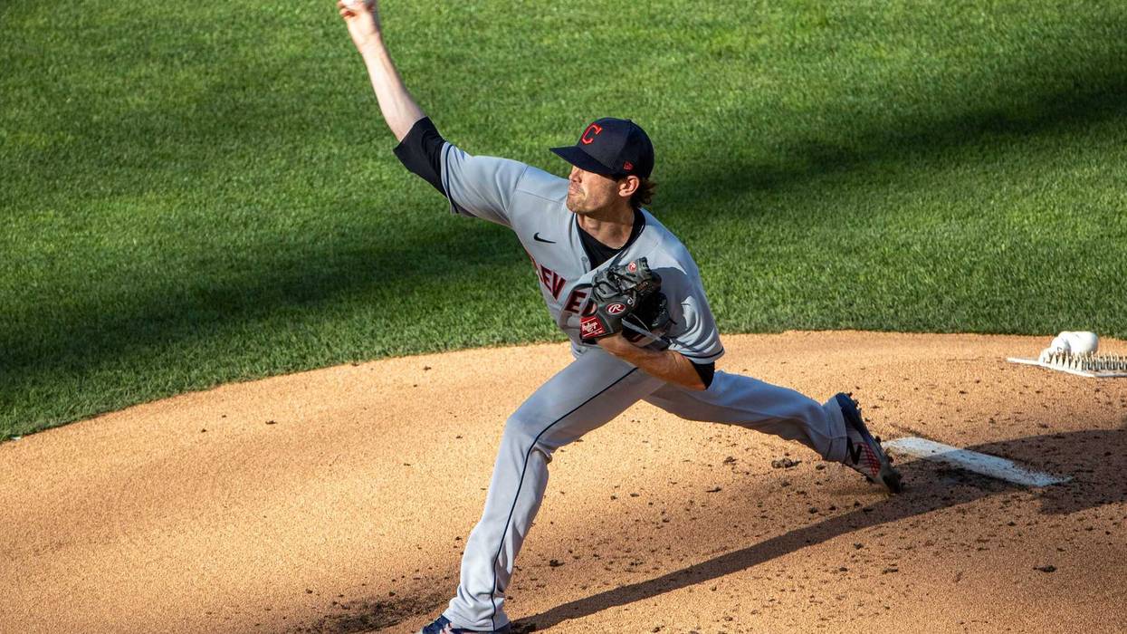 Jul 30, 2020; Minneapolis, Minnesota, USA; Cleveland Indians starting pitcher Shane Bieber (57) delivers a pitch against the Minnesota Twins in the first inning at Target Field. Mandatory Credit: Jesse Johnson-USA TODAY Sports