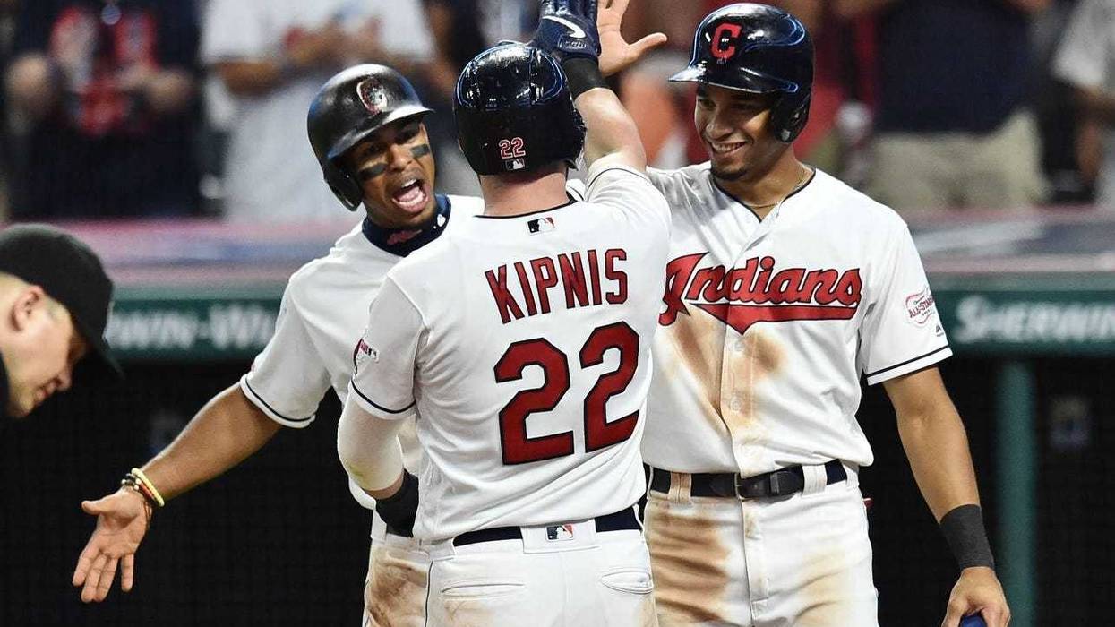Jul 31, 2019; Cleveland, OH, USA; Cleveland Indians shortstop Francisco Lindor (12) and center fielder Oscar Mercado (35) celebrate with second baseman Jason Kipnis (22) after Kipnis hit a three-run home run during the sixth inning against the Houston Ast