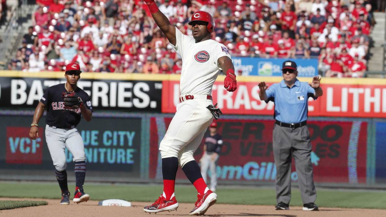 Jul 6, 2019; Cincinnati, OH, USA; Cincinnati Reds right fielder Yasiel Puig (66) reacts after advancing to second base on a throwing error against the Cleveland Indians during the seventh inning at Great American Ball Park. Mandatory Credit: David Kohl-US