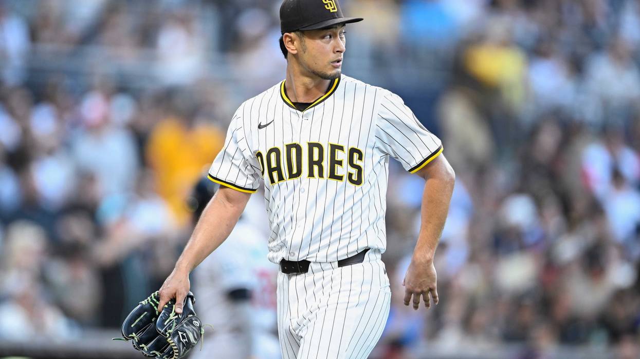 Jul 7, 2025; San Diego, California, USA; San Diego Padres starting pitcher Yu Darvish (11) walks off the field during the second inning against the Arizona Diamondbacks at Petco Park