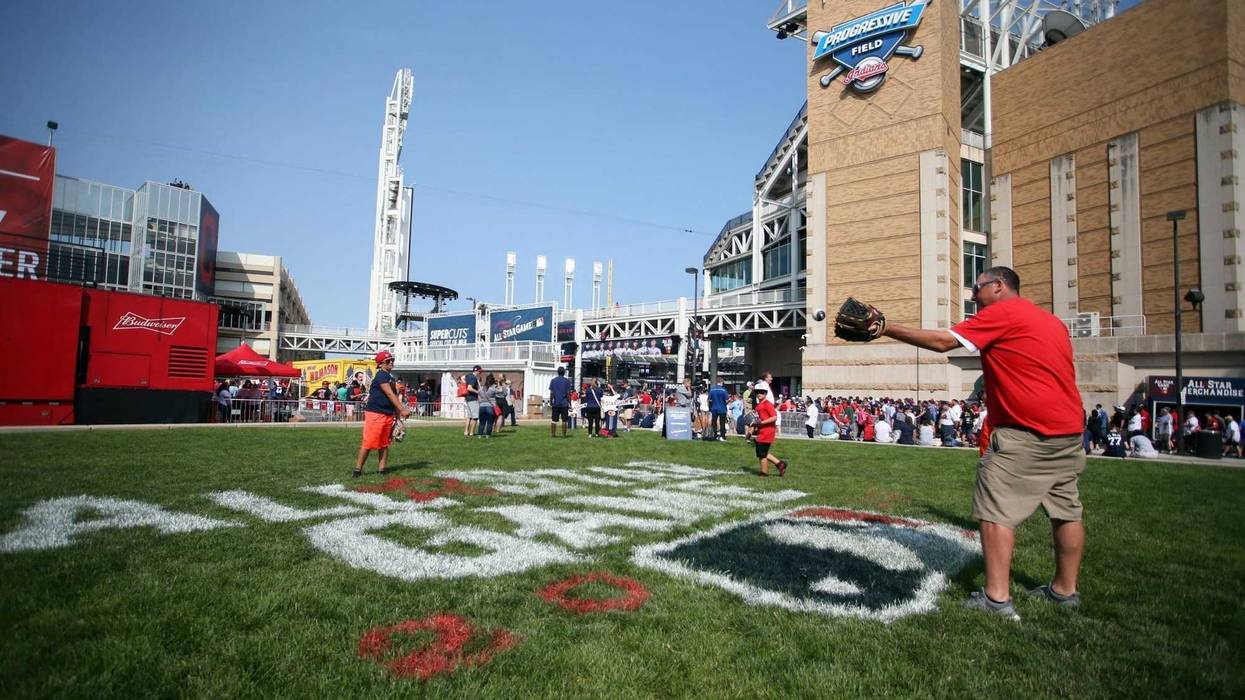 Jul 8, 2019; Cleveland, OH, USA; Fans play catch outside the gates prior to the workouts before the 2019 MLB Home Run Derby at Progressive Field. Mandatory Credit: Charles LeClaire-USA TODAY Sports