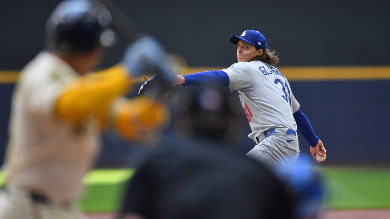 Jul 9, 2025; Milwaukee, Wisconsin, USA; Los Angeles Dodgers starting pitcher Tyler Glasnow (31) pitches during the first inning against the Milwaukee Brewers at American Family Field. Mandatory Credit: Patrick Gorski-Imagn Images