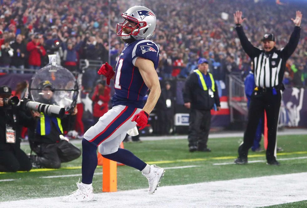 Julian Edelman barrels into the end zone for six