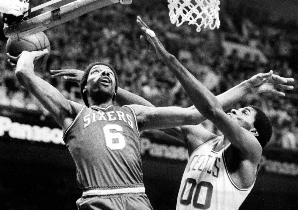 Julius Erving, left