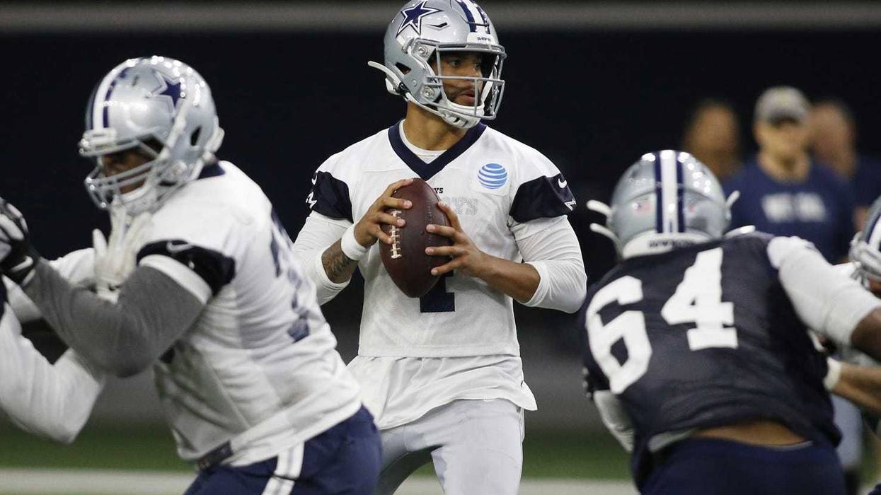 Jun 11, 2019; Frisco, TX, USA; Dallas Cowboys quarterback Dak Prescott (4) goes through a drill during practice at the Ford Center at the Star in Frisco