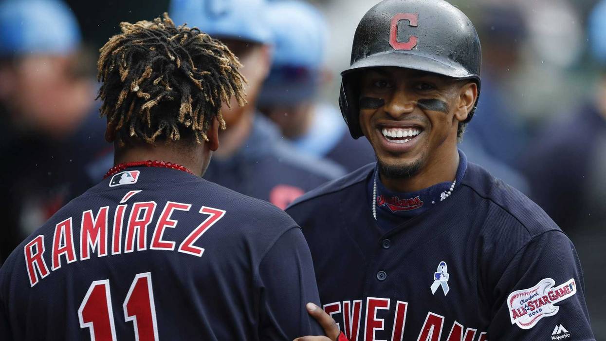 Jun 16, 2019; Detroit, MI, USA; Cleveland Indians shortstop Francisco Lindor (12) shares a laugh with second baseman Jose Ramirez (11) in the dugout during the third inning against the Detroit Tigers at Comerica Park. Mandatory Credit: Raj Mehta-USA TODAY
