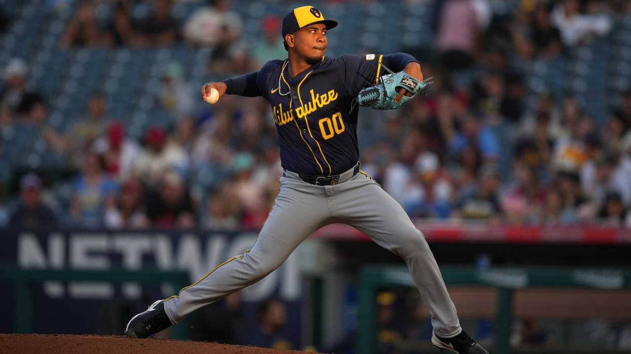 Jun 17, 2024; Anaheim, California, USA; Milwaukee Brewers starting pitcher Carlos F. Rodriguez (0) throws in the third inning against the Los Angeles Angels at Angel Stadium. Mandatory Credit: Kirby Lee-USA TODAY Sports