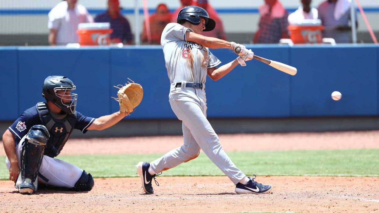Jun 21, 2019; Bradenton, FL, USA; Team Jeter outfielder Petey Halpin (6) reaches base on error during the third inning at IMG Academy.