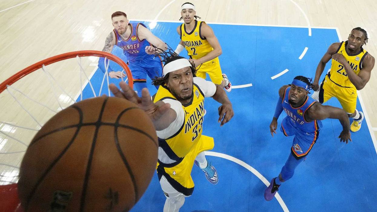 Jun 22, 2025; Oklahoma City, Oklahoma, USA; Indiana Pacers center Myles Turner (33) reaches for the ball against the Oklahoma City Thunder during the first half of game seven of the 2025 NBA Finals at Paycom Center. Mandatory Credit: Kyle Terada-Imagn Images