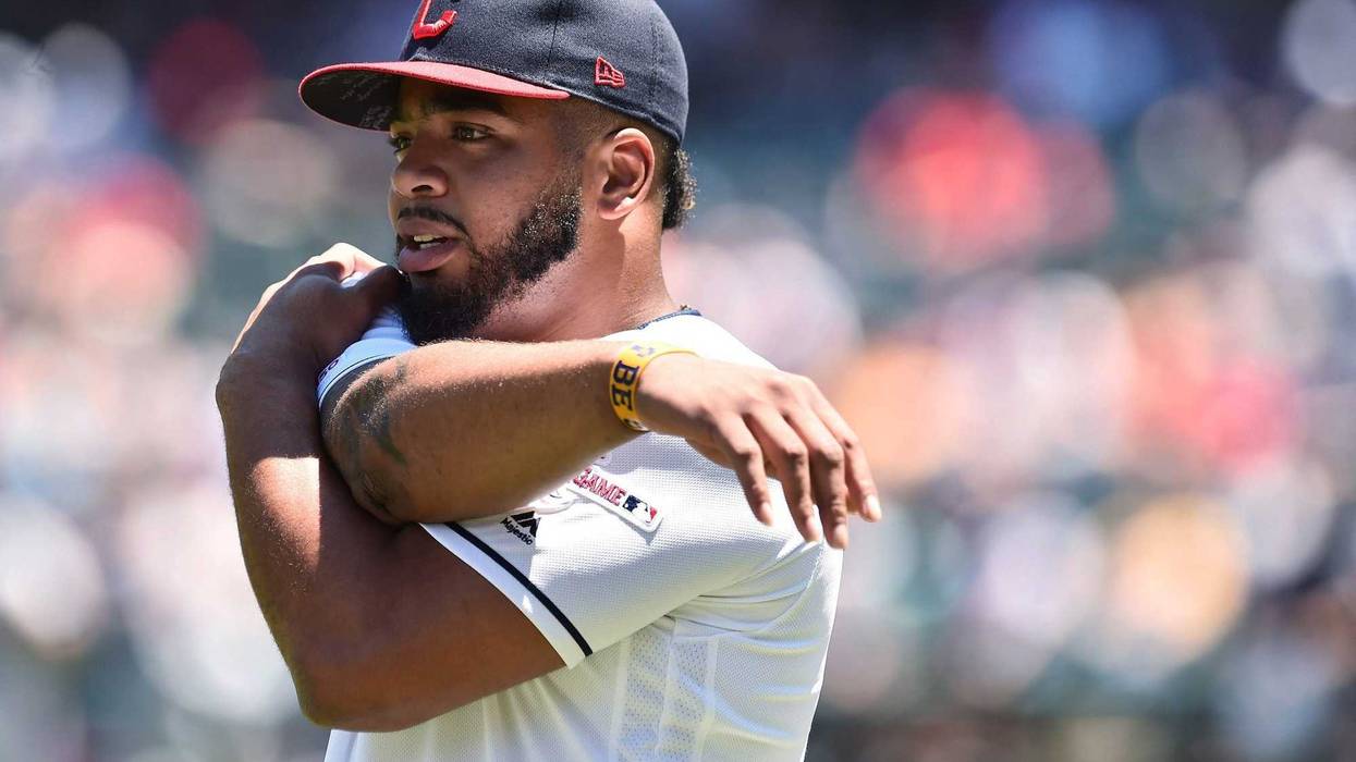 Jun 23, 2019; Cleveland, OH, USA; Cleveland Indians first baseman Bobby Bradley (40) warms up before the game between the Cleveland Indians and the Detroit Tigers at Progressive Field. This will be Bradley's major league debut. Mandatory Credit: Ken Blaze