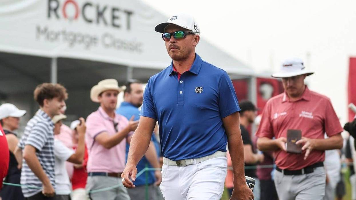 Jun 29, 2023; Detroit, Michigan, USA; Rickie Fowler walks towards the 16th tee box during the first round of the Rocket Mortgage Classic golf tournament at Detroit Golf Club.