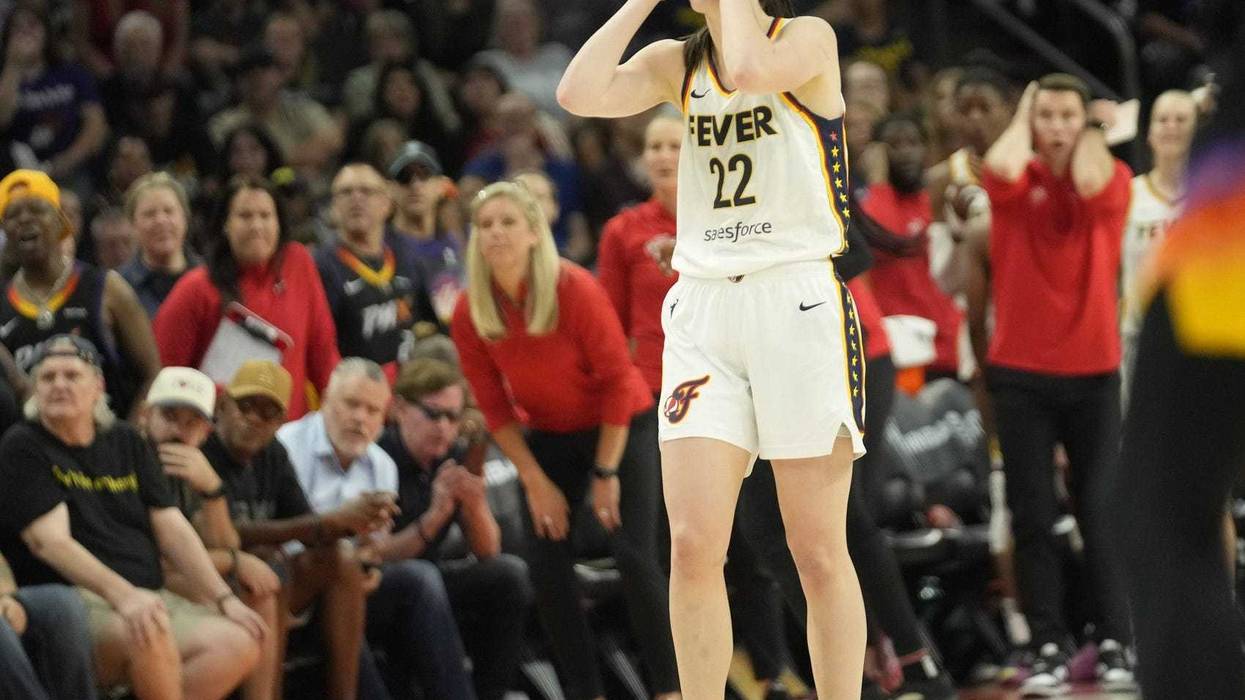 Jun 30, 2024; Phoenix, Ariz., U.S.; Indiana Fever guard Caitlin Clark (22) reacts to a foul during the fourth quarter against the Phoenix Mercury at Footprint Center.