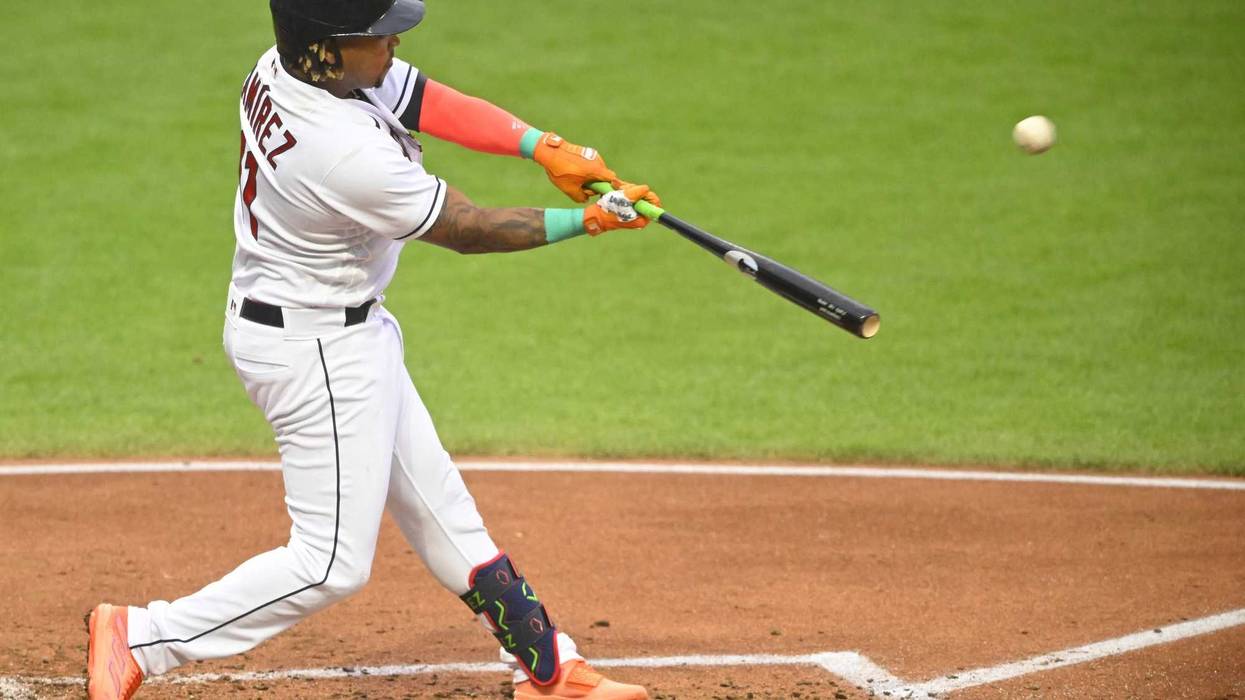 Jun 8, 2023; Cleveland, Ohio, USA; Cleveland Guardians third baseman Jose Ramirez (11) hits a two-run home run in the third inning against the Boston Red Sox at Progressive Field.