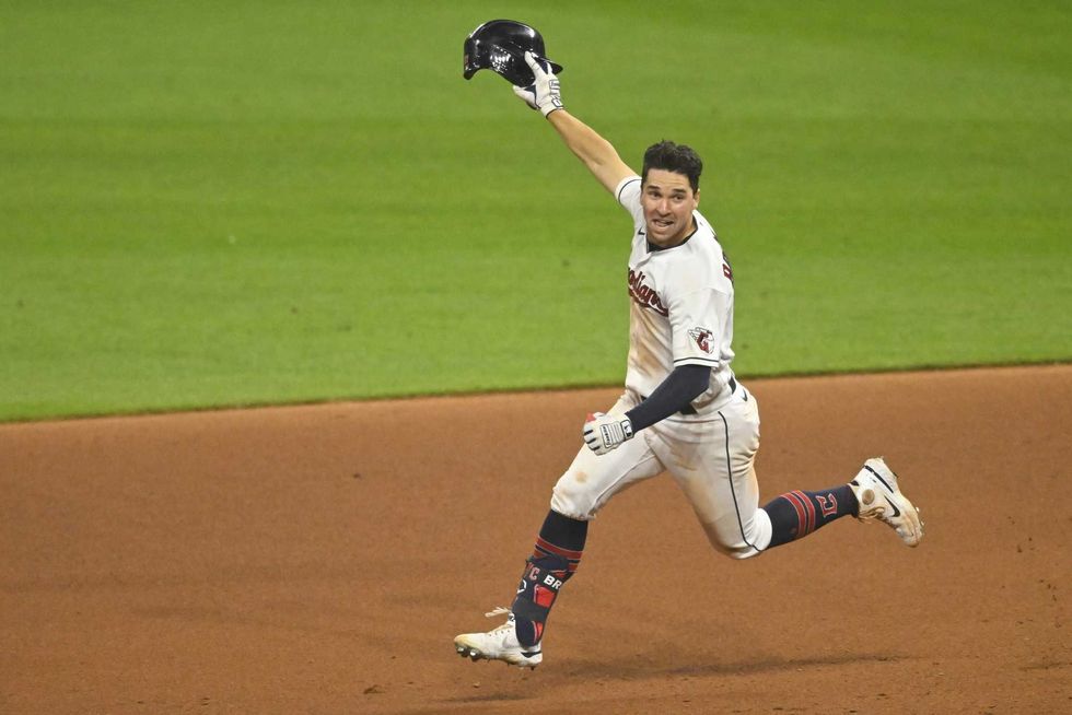 Jun 9, 2023; Cleveland, Ohio, USA; Cleveland Guardians right fielder Will Brennan (17) celebrates his game-winning double in the 14th inning against the Houston Astros at Progressive Field.