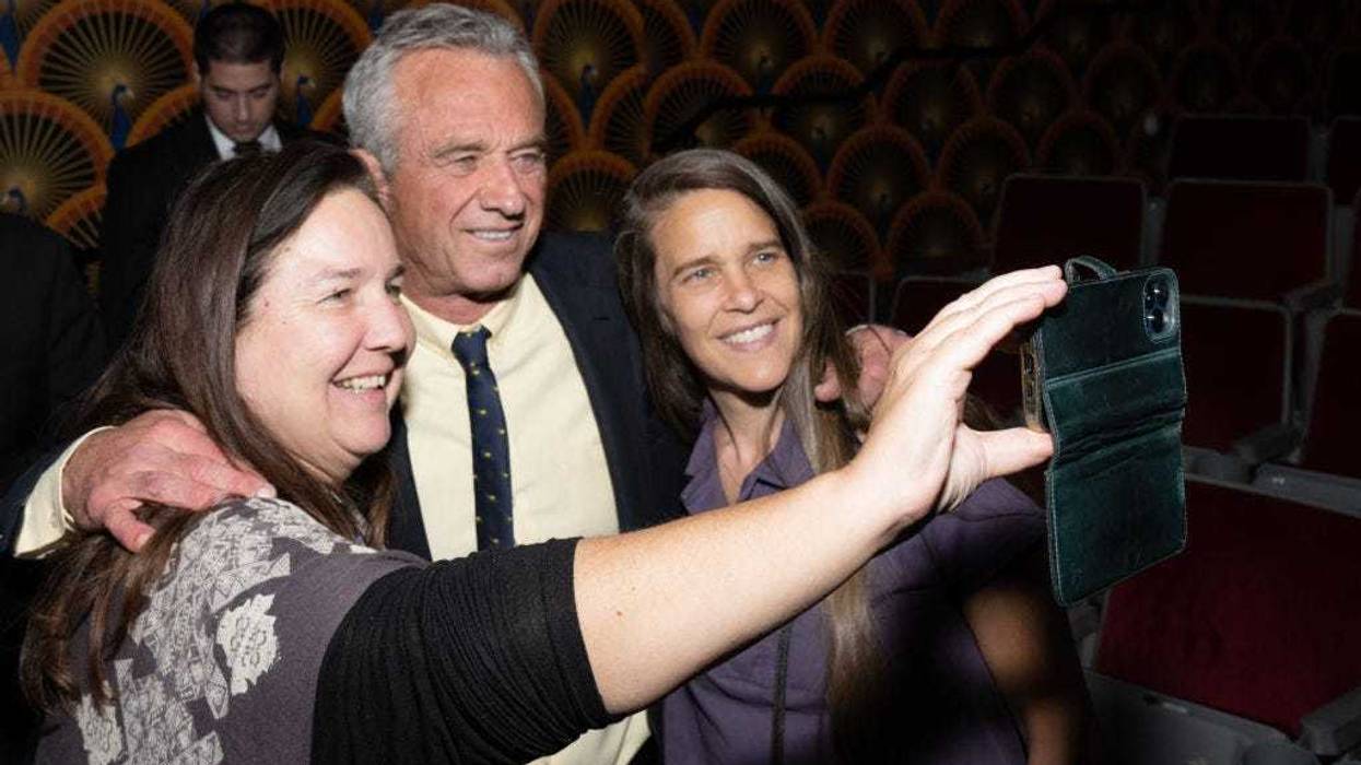 JUNE 05: Robert F. Kennedy, Jr. takes a selfie with guests during the Michael Smerconish SiriusXM Town Hall live broadcast at The Centre Theater on June 05, 2023 in Philadelphia, Pennsylvania. (Photo by Lisa Lake/Getty Images for SiriusXM)