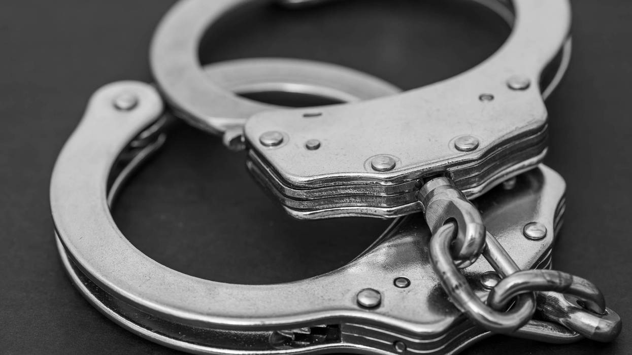Justice concept, police handcuffs isolated