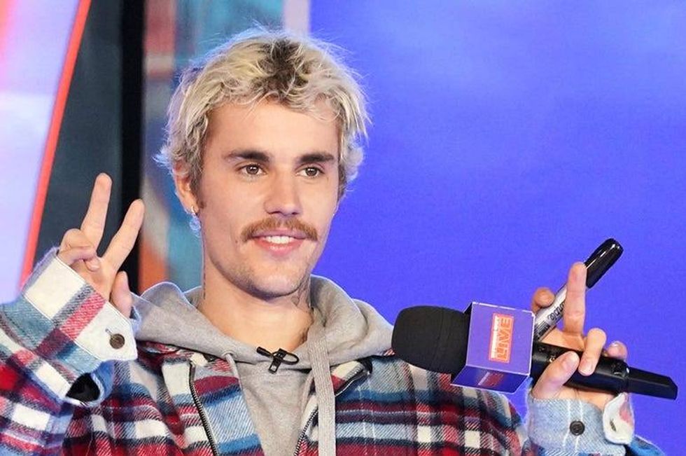 Justin Bieber jokes about fighting Tom Cruise… again