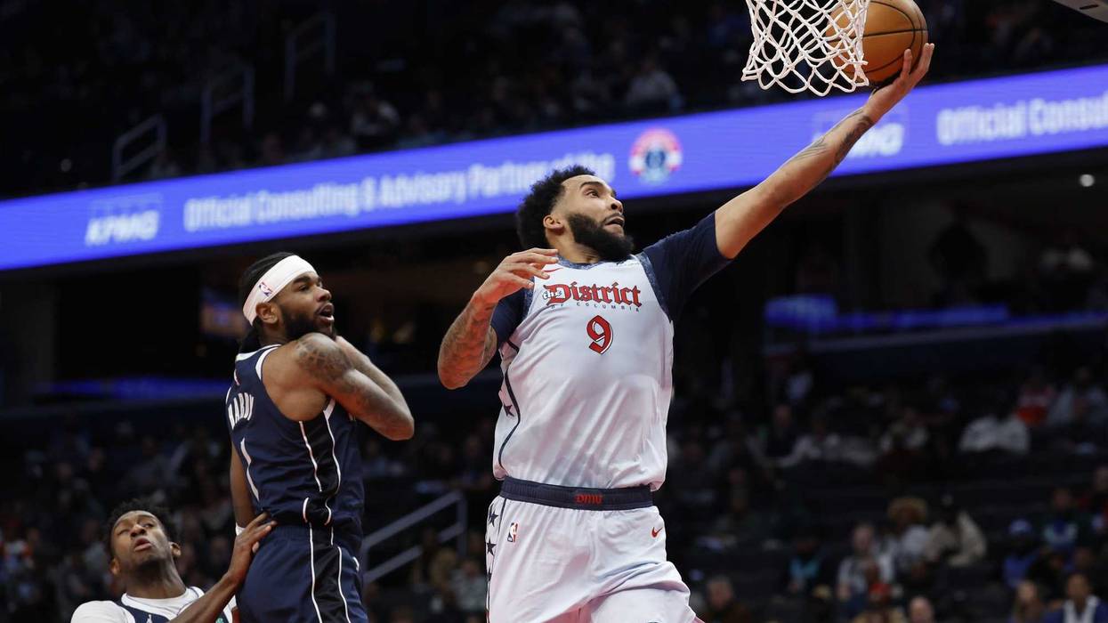 Justin Champagnie layup against Denver