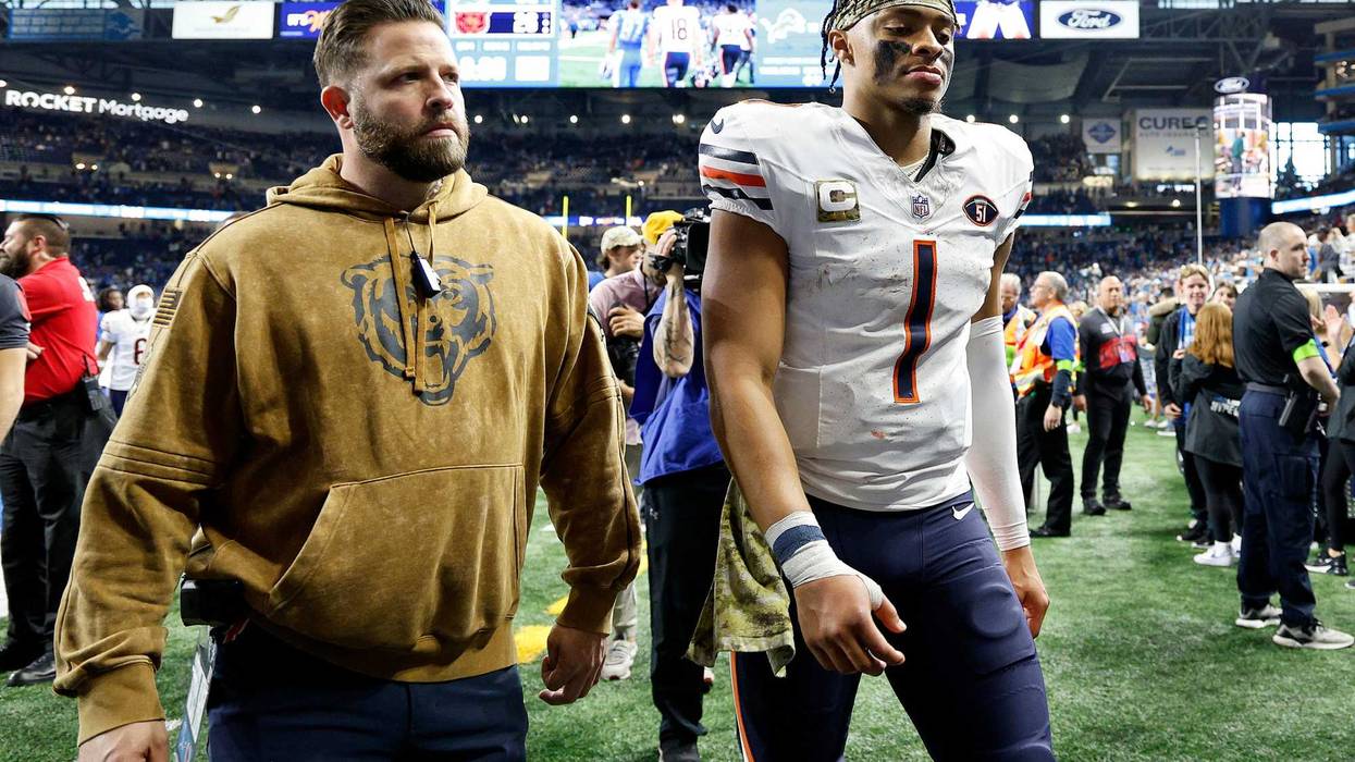 Justin Fields, of the Chicago Bears, walks off the field after a game against the Detroit Lions at Ford Field on Nov. 19, 2023, in Detroit.