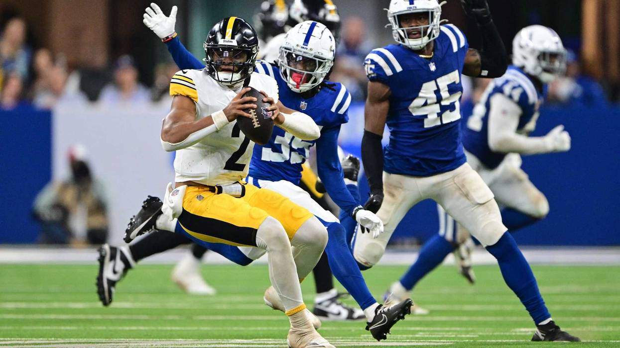 Justin Fields running from sack