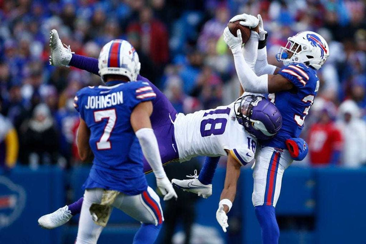 Justin Jefferson #18 of the Minnesota Vikings catches a pass in front of Cam Lewis #39 of the Buffalo Bills during the fourth quarter at Highmark Stadium on November 13, 2022 in Orchard Park, New York.