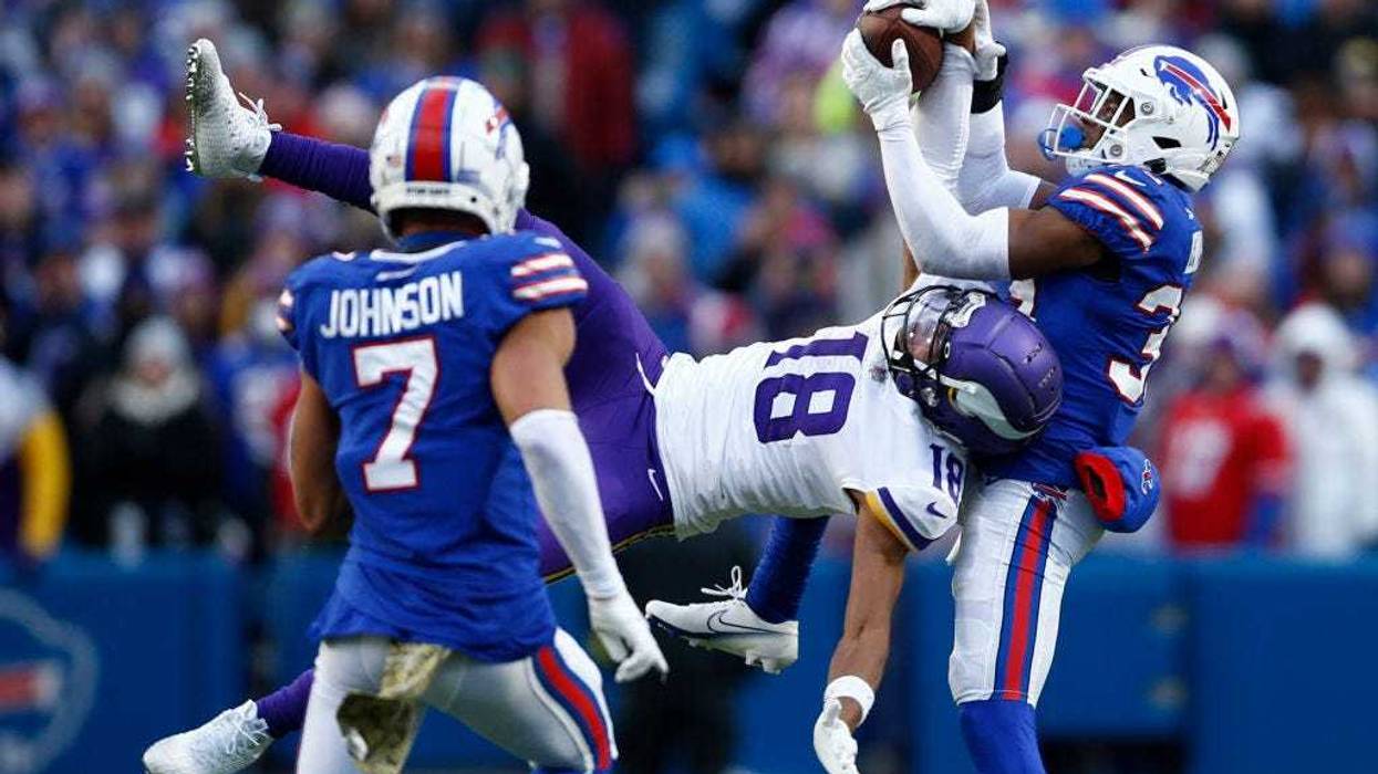Justin Jefferson #18 of the Minnesota Vikings catches a pass in front of Cam Lewis #39 of the Buffalo Bills during the fourth quarter at Highmark Stadium on November 13, 2022 in Orchard Park, New York.