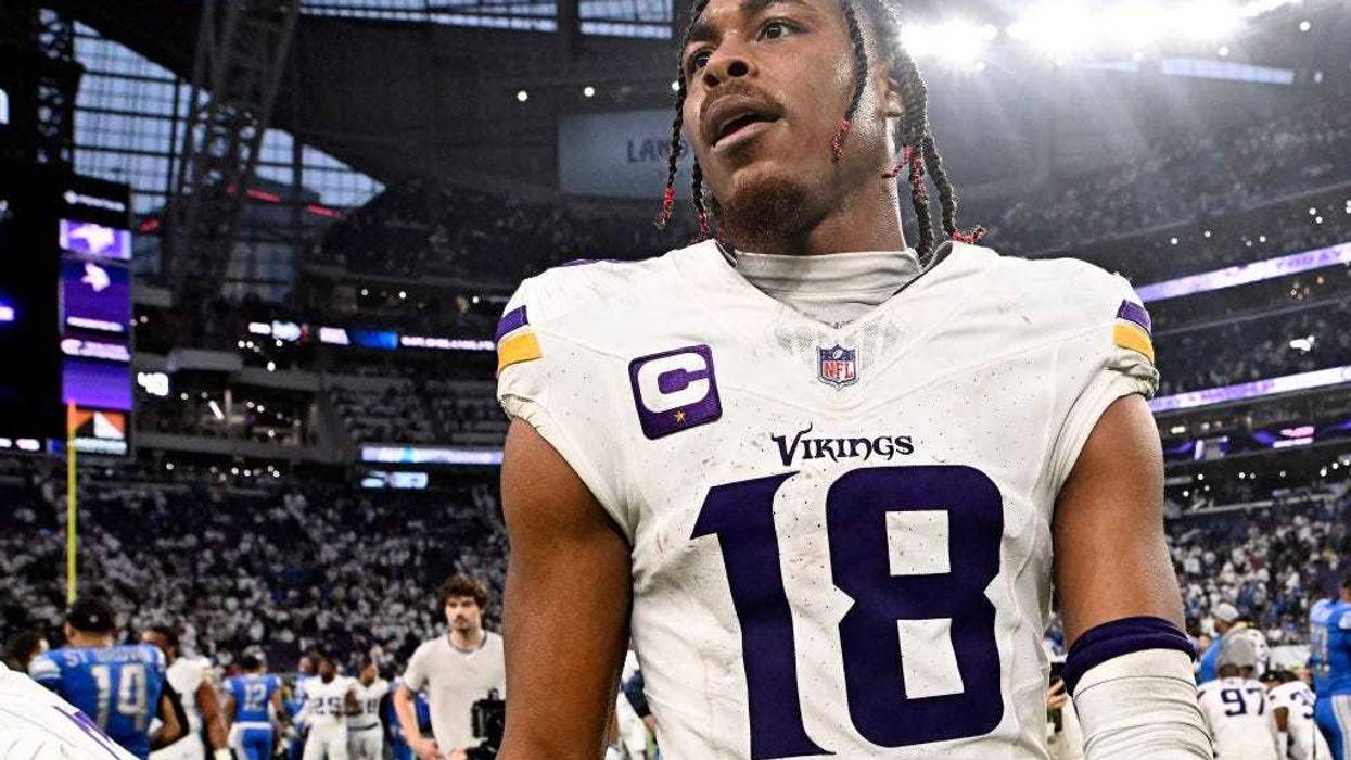 Justin Jefferson #18 of the Minnesota Vikings reacts after the team's 30-24 loss against the Detroit Lions at U.S. Bank Stadium on December 24, 2023 in Minneapolis, Minnesota.