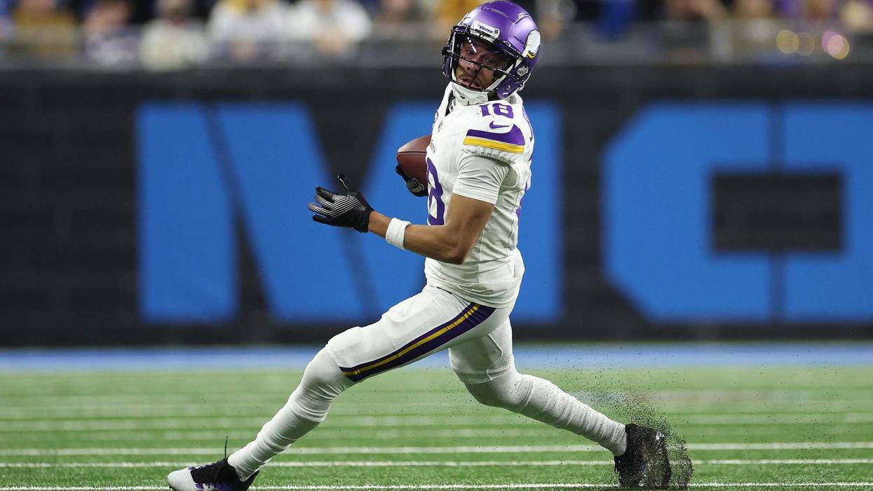 Justin Jefferson #18 of the Minnesota Vikings runs the ball after a catch during the third quarter against the Detroit Lions at Ford Field on January 05, 2025 in Detroit, Michigan.