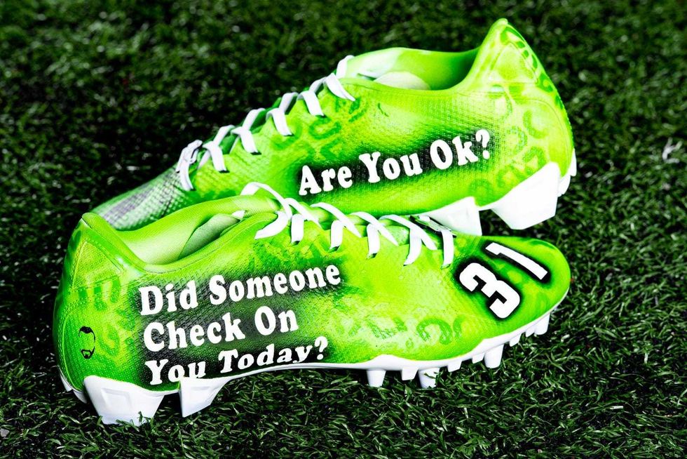 Juston Burris Dream the Impossible cleats