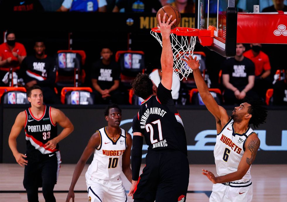 Jusuf Nurkic attacks the rim for a one-handed flush