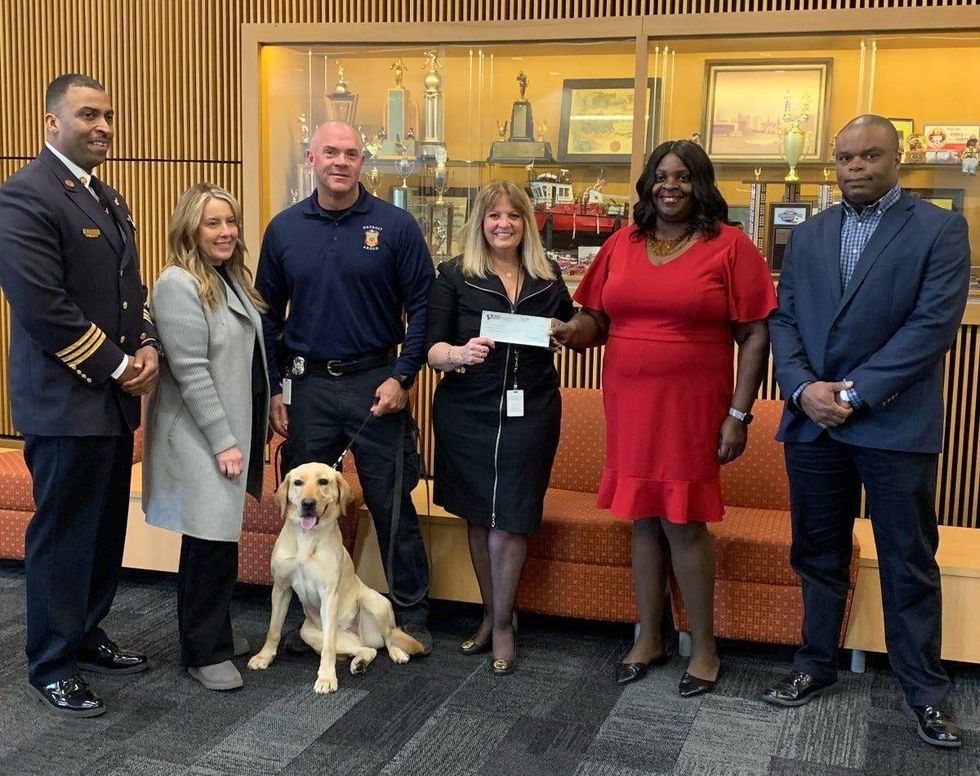 K-9 Cricket and DFD officials