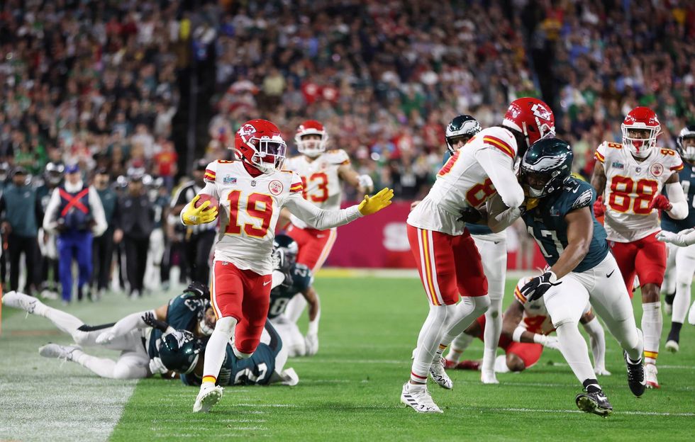 Kadarius Toney of the Kansas City Chiefs carries the ball against the Philadelphia Eagles during the fourth quarter in Super Bowl LVII at State Farm Stadium on February 12, 2023 in Glendale, Arizona.