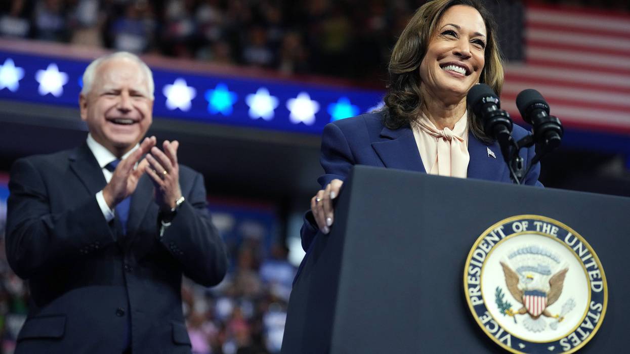 Kamala Harris and Tim Walz speaking at a rally in the Liacouras Center in North Philadelphia.