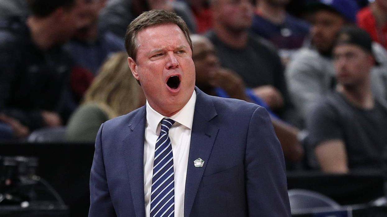 Kansas basketball coach Bill Self gets animated on the sidelines.