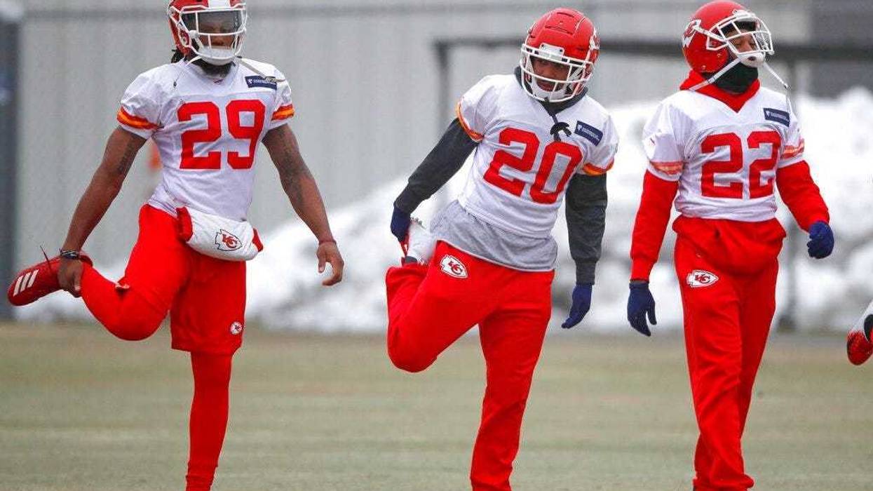 Kansas City Chiefs defensive back Eric Berry (29), cornerback Steven Nelson (20) and defensive back Orlando Scandrick (22) stretch during workouts Friday, Jan. 18, 2019, in Kansas City