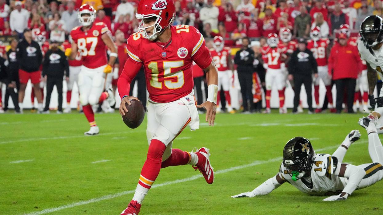 Kansas City Chiefs quarterback Patrick Mahomes (15) runs the ball against the New Orleans Saints during the first half at GEHA Field at Arrowhead Stadium.
