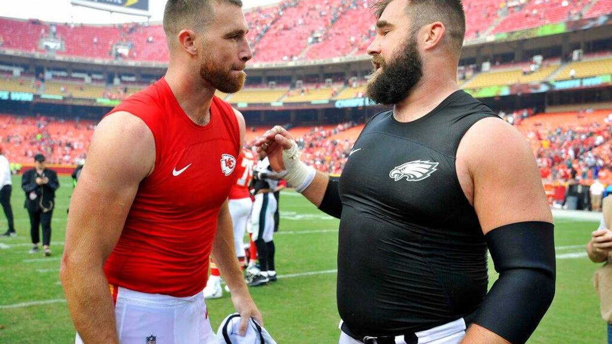 Kansas City Chiefs tight end Travis Kelce, left, talks to his brother, Philadelphia Eagles center Jason Kelce