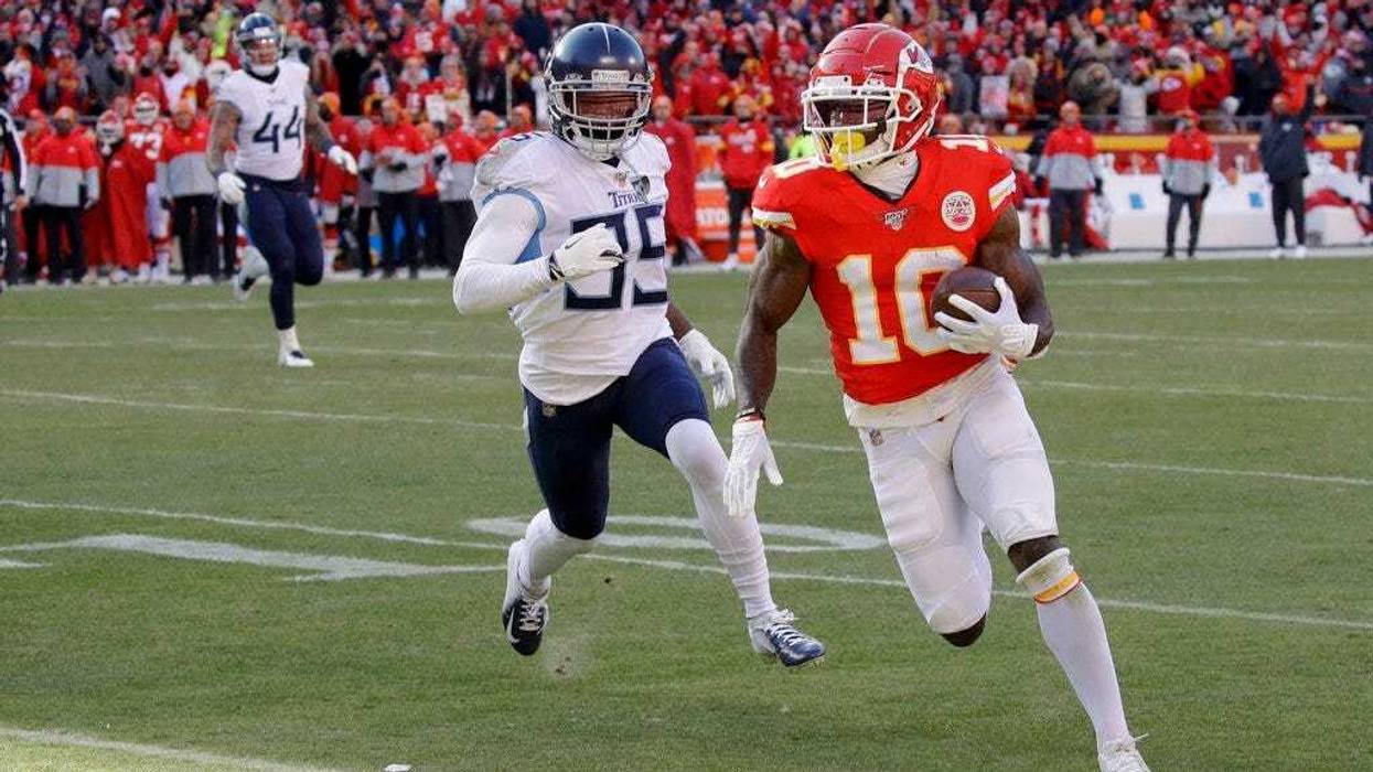 Kansas City Chiefs' Tyreek Hill runs for a touchdown during the first half of the NFL AFC Championship football game against the Tennessee Titans Sunday, Jan. 19, 2020, in Kansas City, MO.